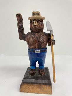 Smokey Bear wood carving by Gary Osier, 4'' square base 8'' high